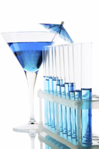 Chemical laboratory glassware equipment and blue cocktail